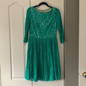 Beautiful turquoise dress size 8 with sleeves